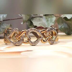 Goldtone cuff stylle bracelet with hearts